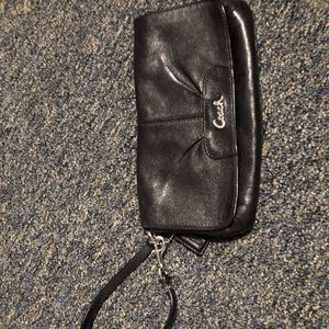 Black leather Coach wristlet